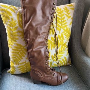 Brown lace up over the knee leather boots